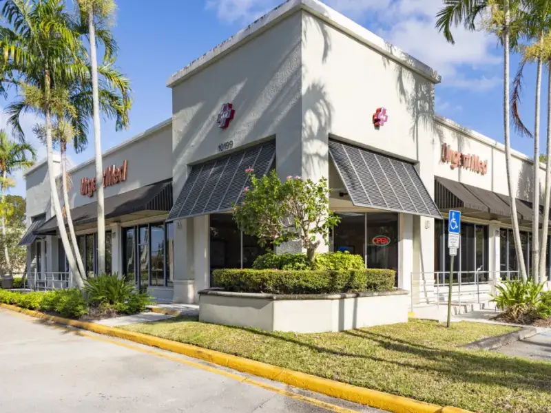 UrgentMed Plantation clinic entrance at 10199 Cleary Blvd, Suite 10, Plantation, FL 33324