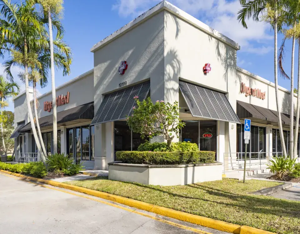 UrgentMed Plantation urgent care storefront at 10199 Cleary Blvd, walk-in clinic in Plantation FL
