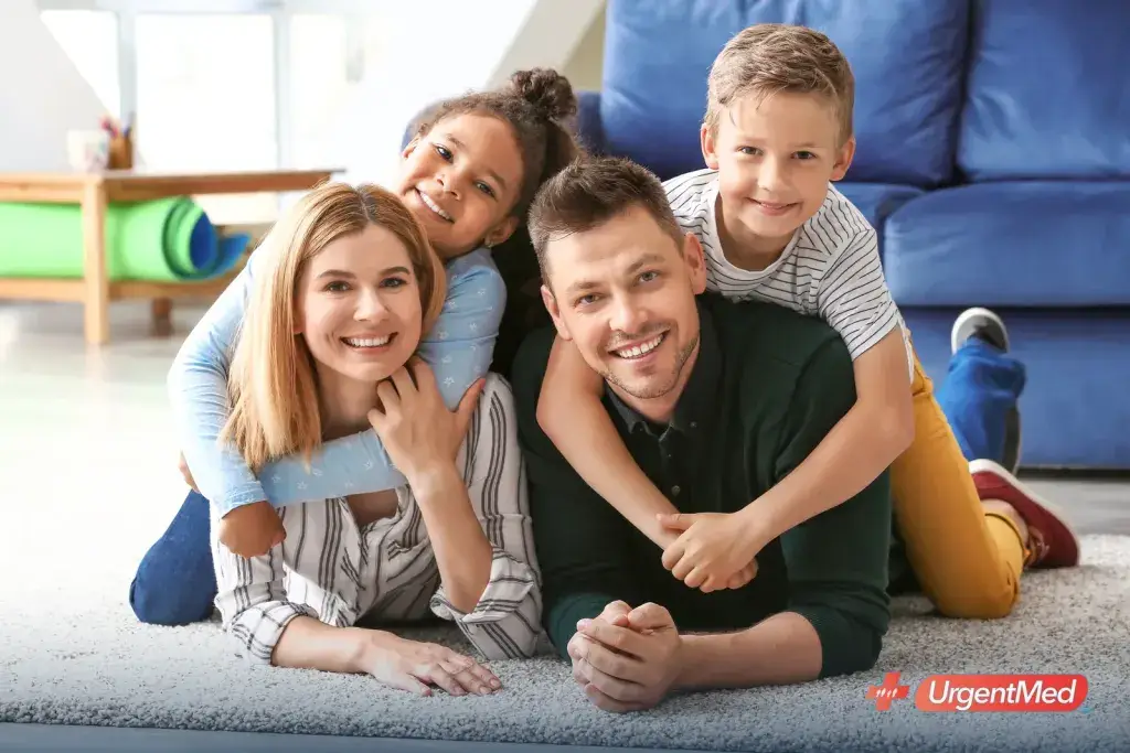 Parents at home with their two young children