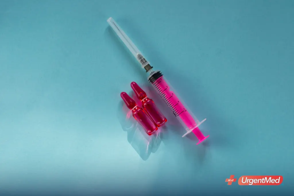 Vitamin B ampoules and a syringe