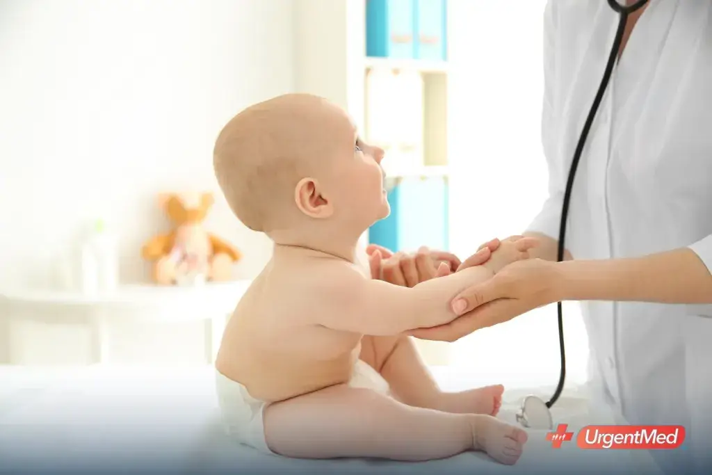 Infant having a checkup with a provider