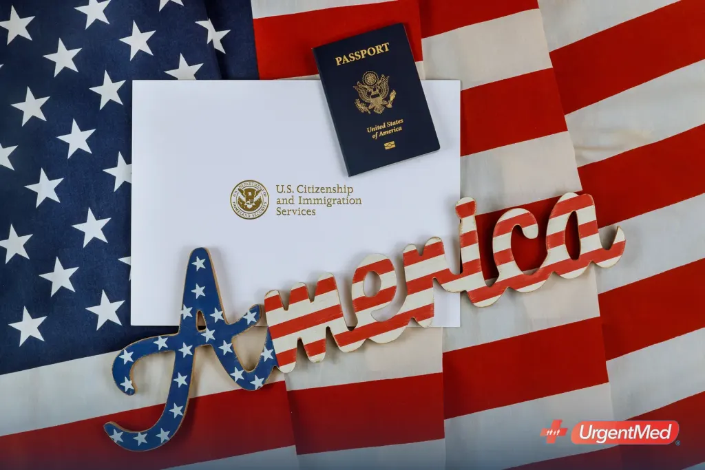 USCIS envelope and a passport on an American flag — paperwork for the immigration medical exam