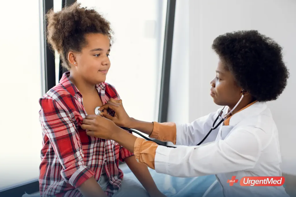 Teen athlete having a sports physical with a provider