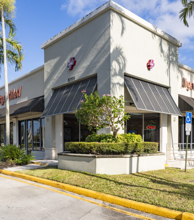 UrgentMed Plantation urgent care storefront at 10199 Cleary Blvd, walk-in clinic in Plantation FL